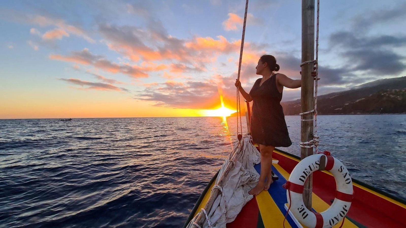 Discover Madeira from the Sea at Sunset – An Authentic Xavelha Boat Experience